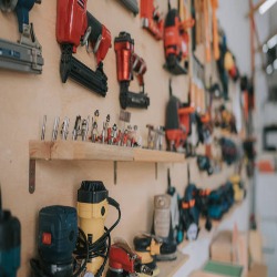Interior of Delhi Power Tools workshop with tools on racks